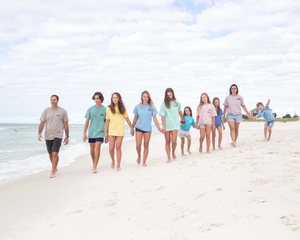 Brittany Curry, along with her husband, Brett Curry, and their kids vacation at the beach.