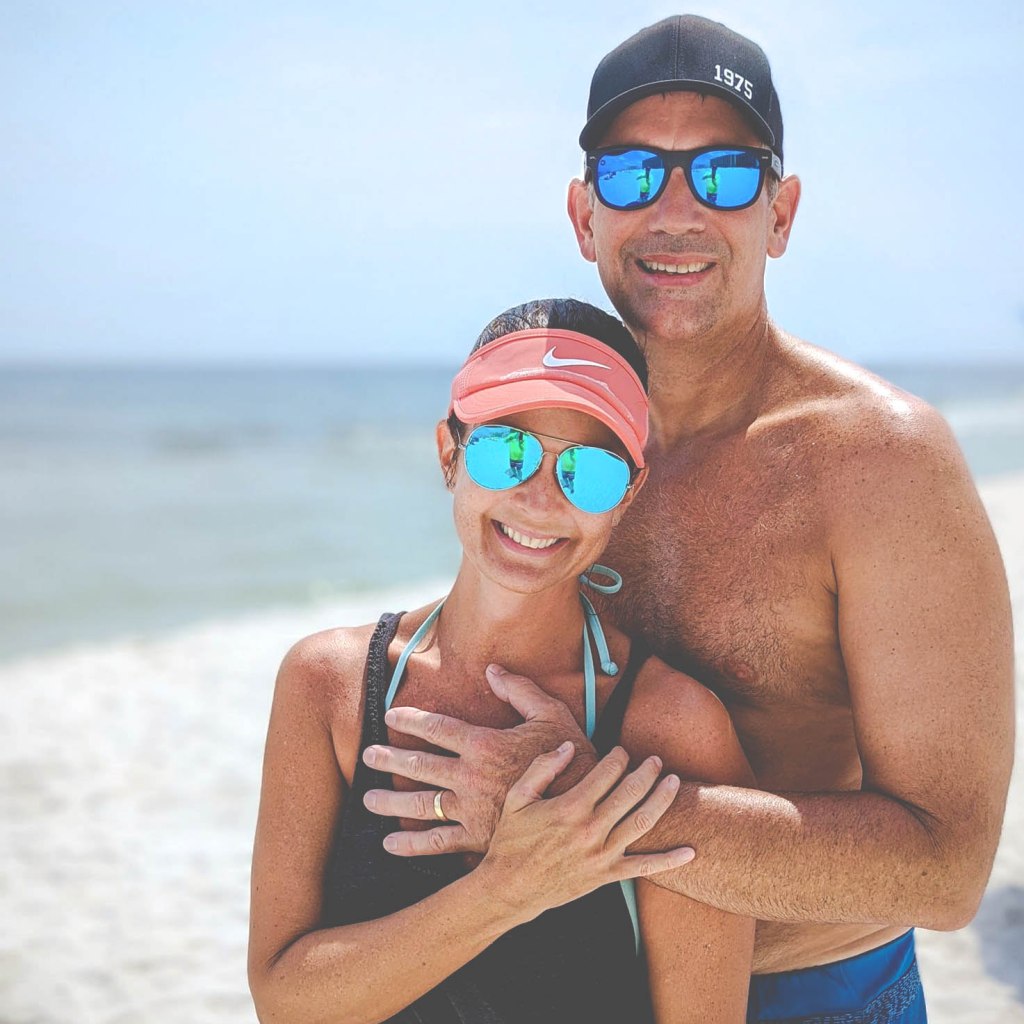 Image: Kristen Walters and Doug Walters at Orange Beach, Alabama, celebrating one year since Doug's journey began with an intestinal obstruction. Doug is wearing his big, gold wedding ring.