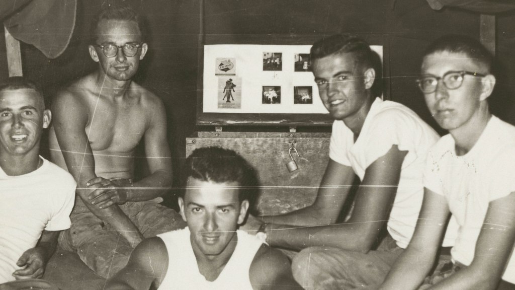 Image: Grant Townsend with four other soldiers in his Army unit while stationed in Vietnam.