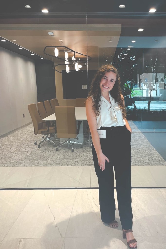 Lauren O'Steen poses in her commercial real estate office building in Dallas, Texas.