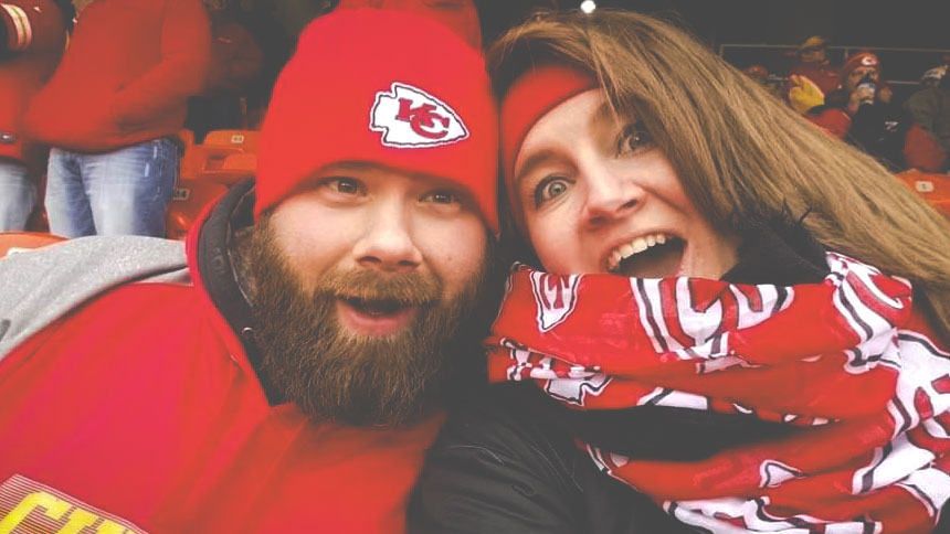 Dezirae Ritchie and her husband Chris at a Kansas City Chiefs football game.
